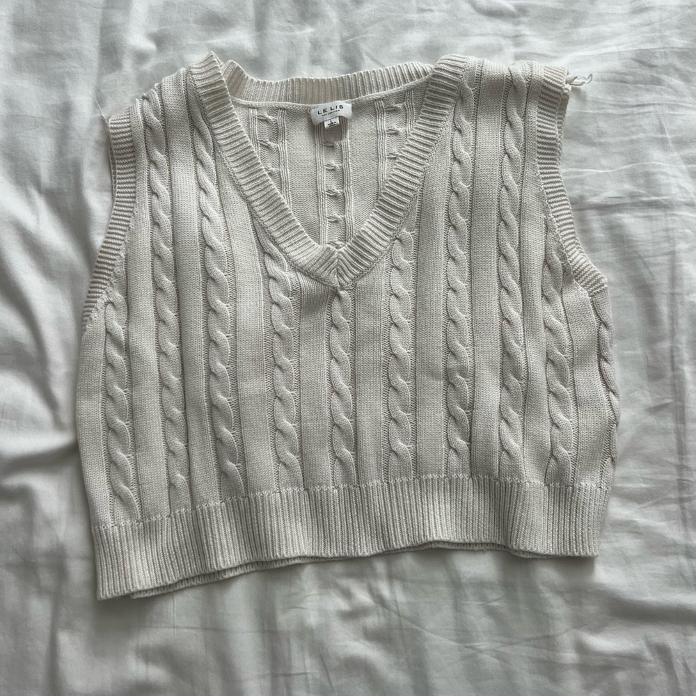 White sweater vest